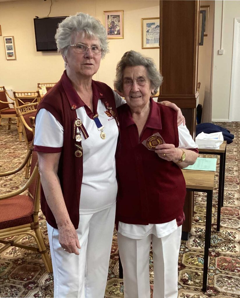 A female bowler being presented with her Essex County badge - at the age of 92!